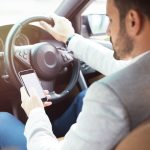 mobile phone driving law Dubai